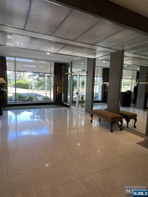301 Beech Street, Unit 8D Hackensack, NJ 07601 - Photo 14 of 15 a lobby with furniture and window