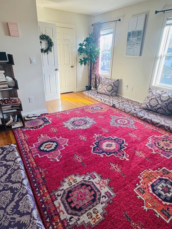 25 John Street, Unit 3 Attleboro, MA 02703 - Photo 6 of 10 a bedroom with a bed and a window