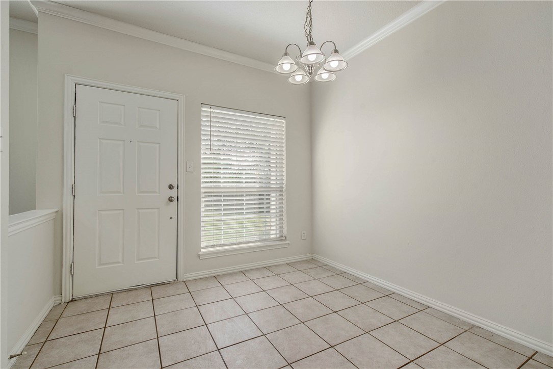 1001 Krenek Tap Road, Unit 702 College Station, TX 77840 - Photo 2 of 15 a view of an empty room with a window
