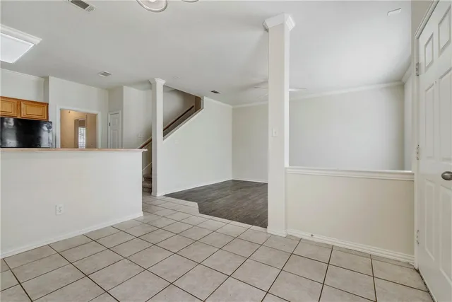 a view of a hallway view with staircase