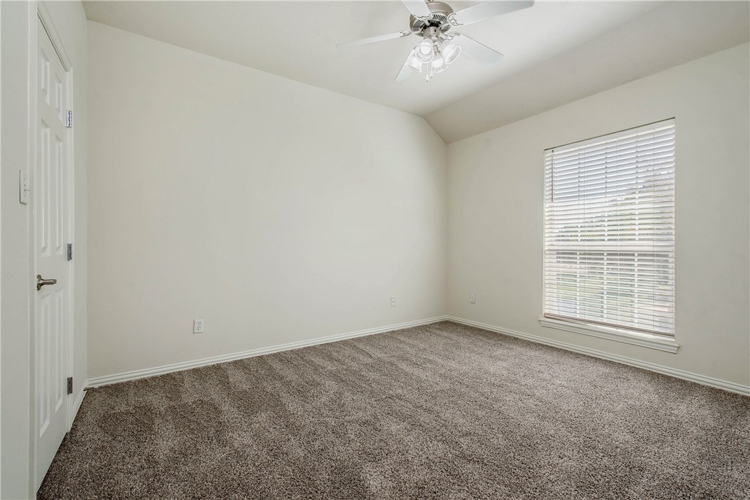 1001 Krenek Tap Road, Unit 702 College Station, TX 77840 - Photo 8 of 15 an empty room with a window