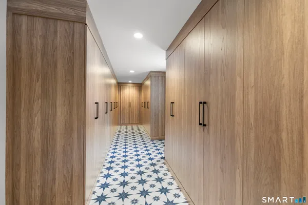 a bathroom with a glass door shower