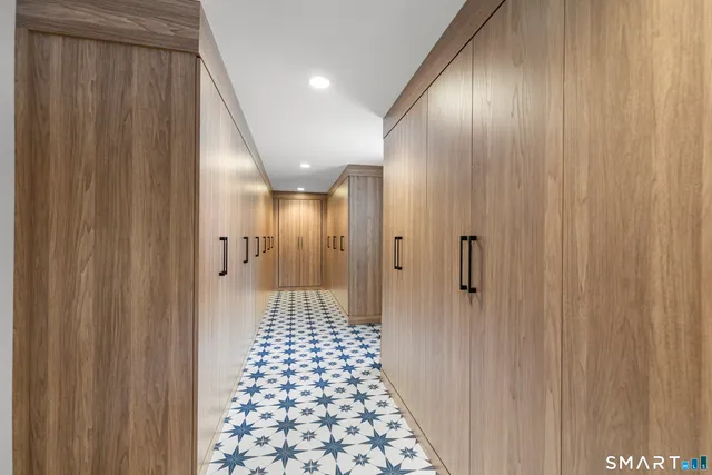 a bathroom with a glass door shower