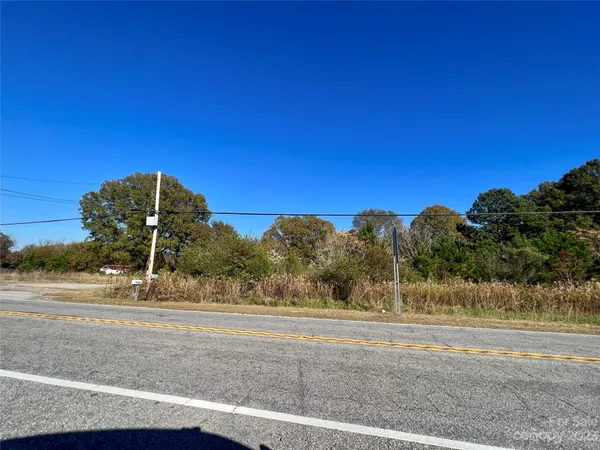a view of a yard with an outdoor space