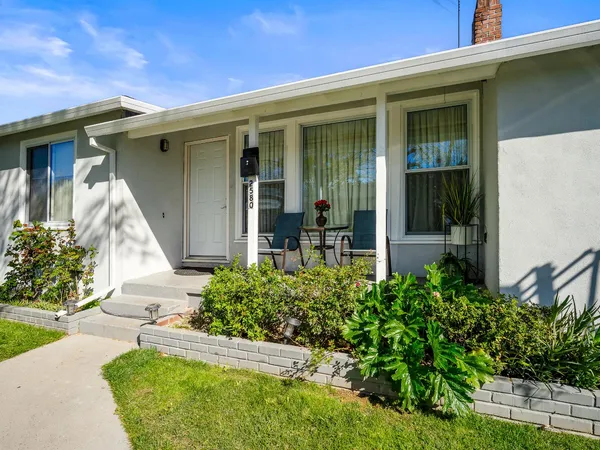 front view of a house with a yard