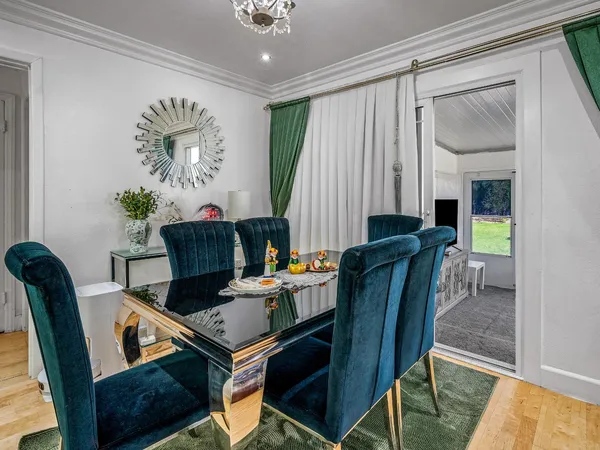 a living room with furniture and a table