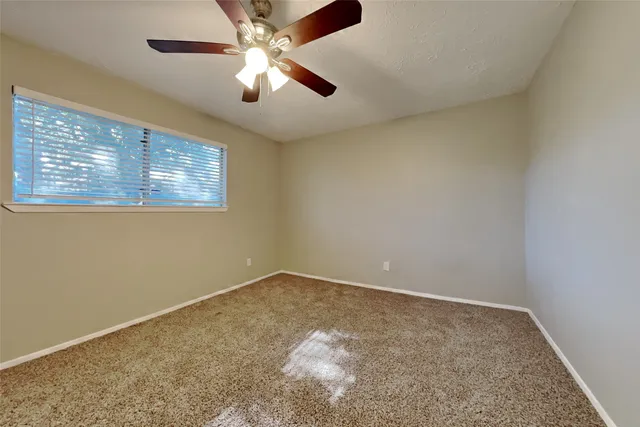 en empty room with windows