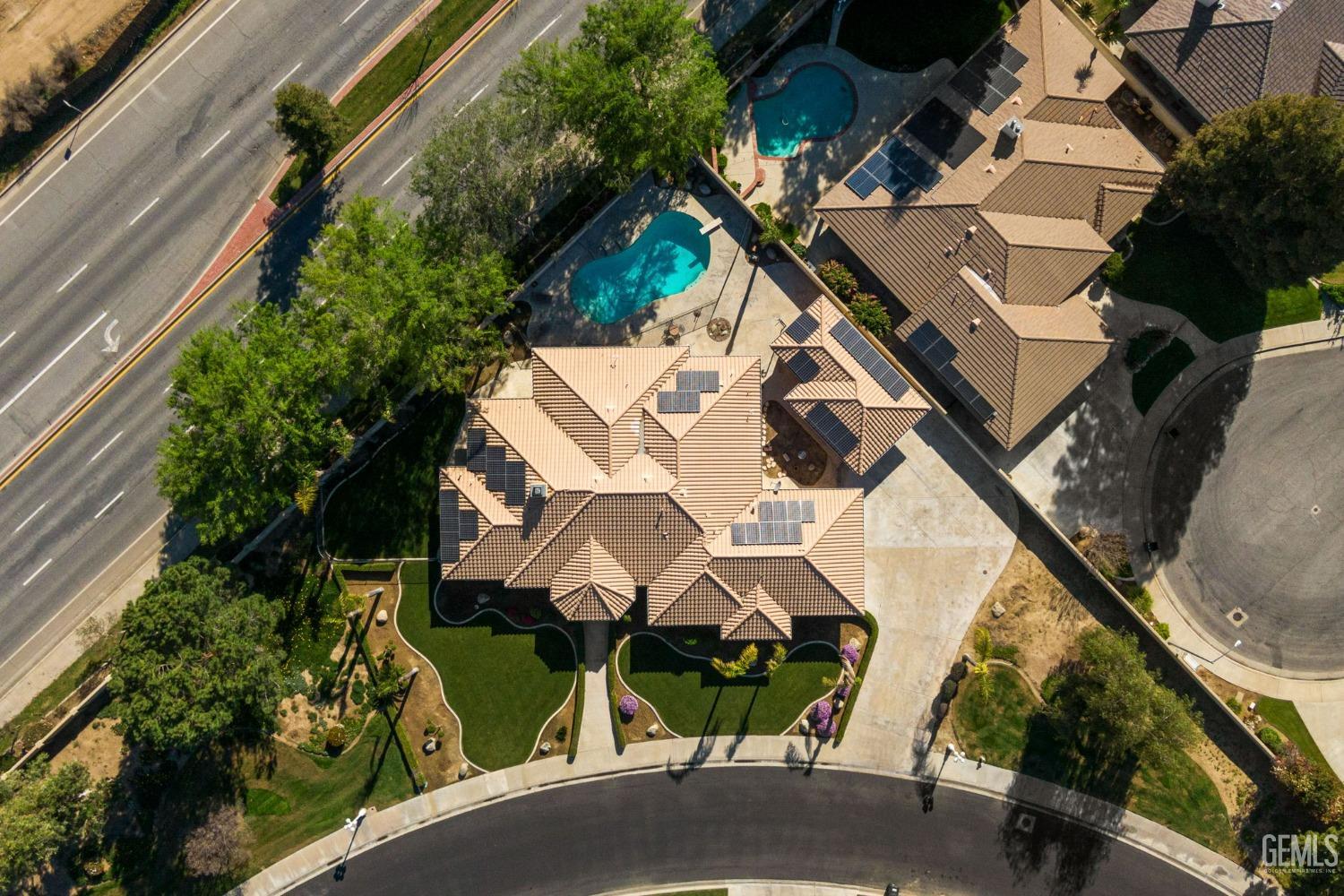 Undisclosed Address Bakersfield, CA 93308 - Photo 28 of 30 an aerial view of a house with a yard and potted plants