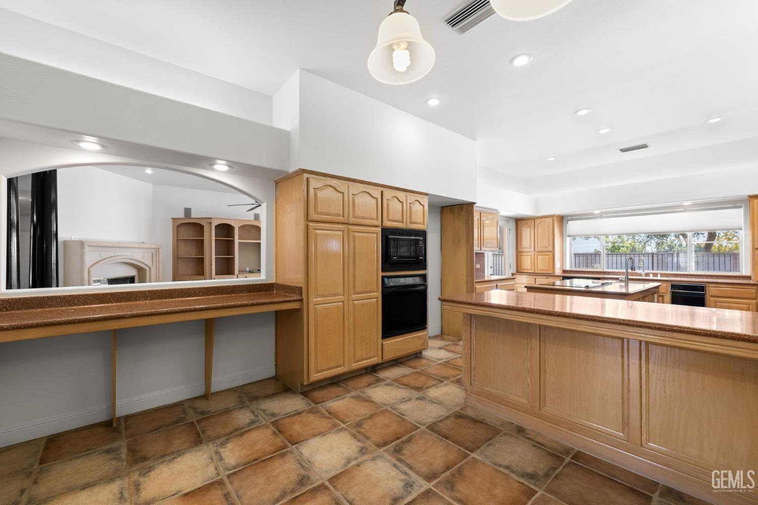 Undisclosed Address Bakersfield, CA 93308 - Photo 9 of 30 a kitchen with stainless steel appliances granite countertop a sink and cabinets