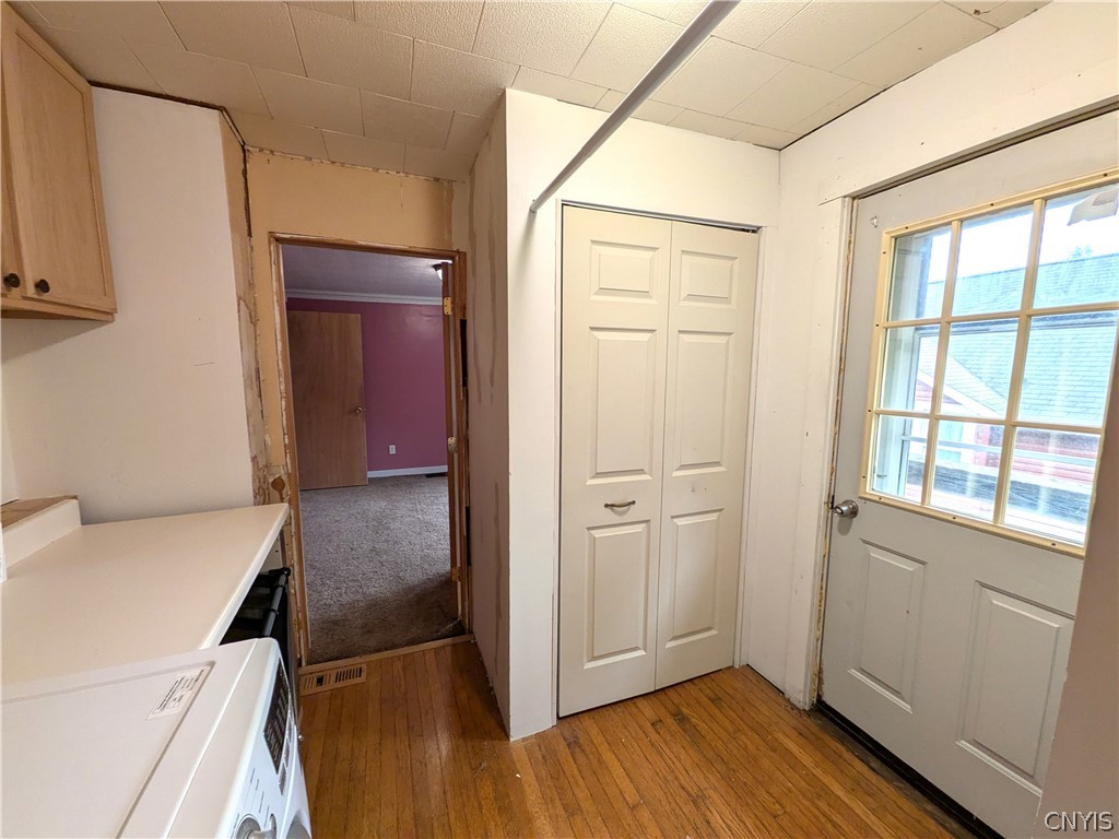 87 Nelson Street Auburn, NY 13021 - Photo 24 of 38 Laundry Room off of Bedroom 2 with balcony