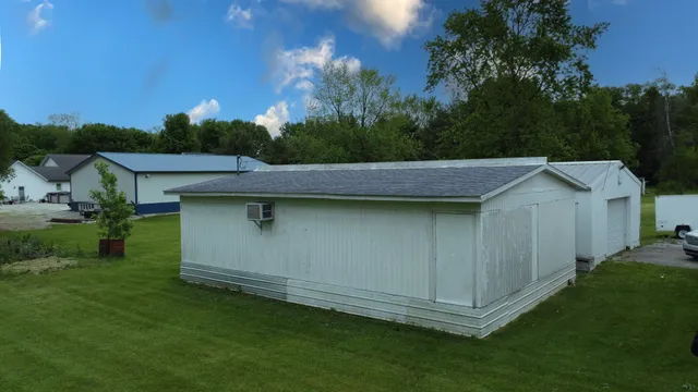 a view of a backyard with a garden