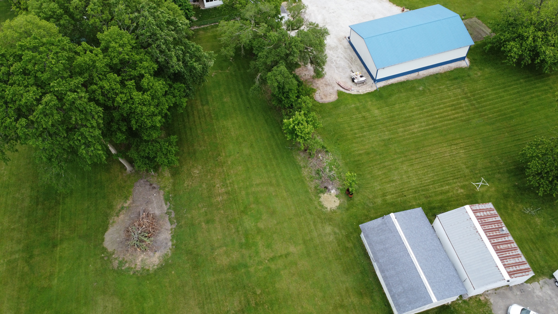 205 North Park Street Milford, IL 60953 - Photo 23 of 23 a view of a two chairs in a yard