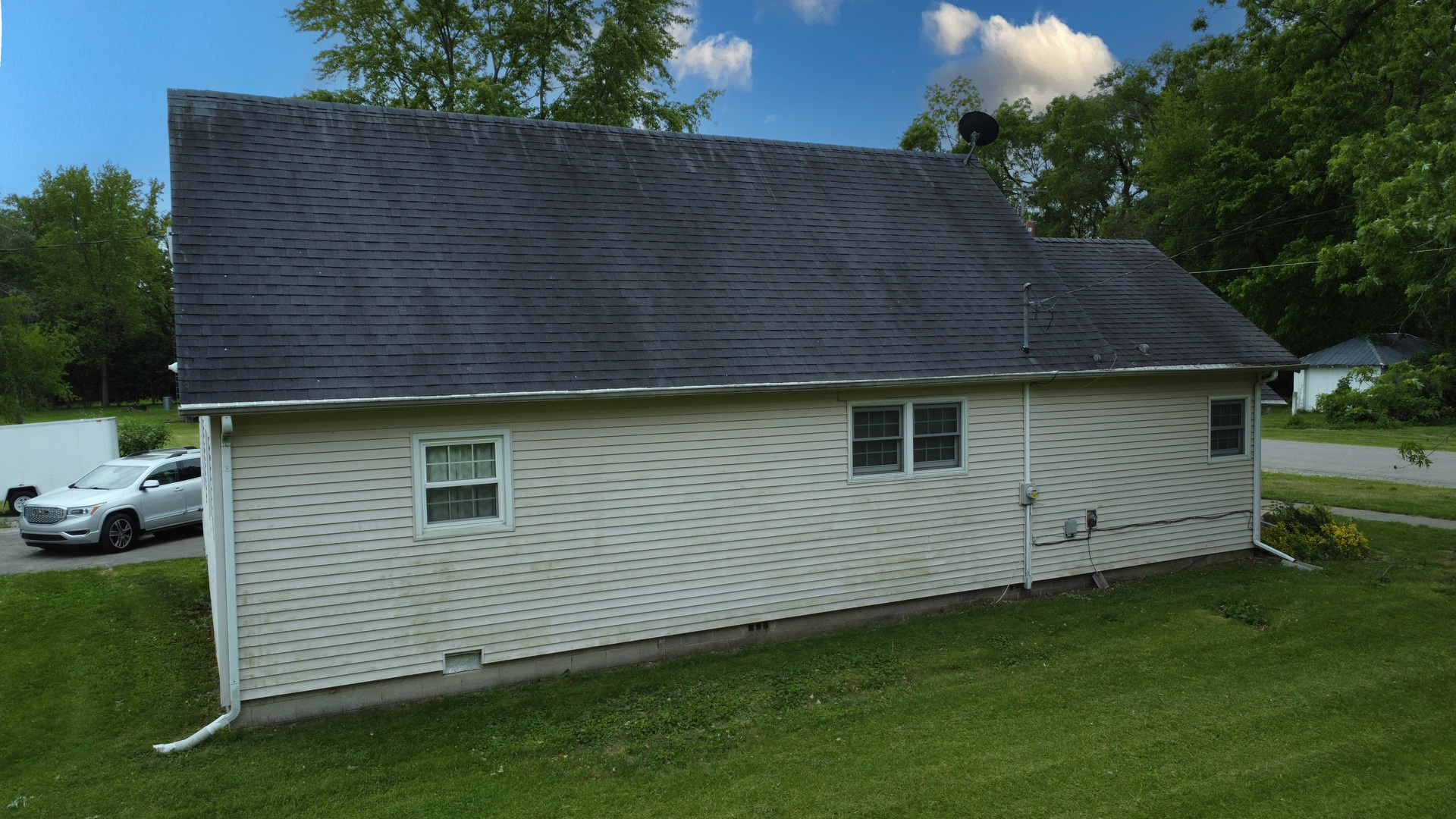 205 North Park Street Milford, IL 60953 - Photo 3 of 23 a view of a house with a backyard