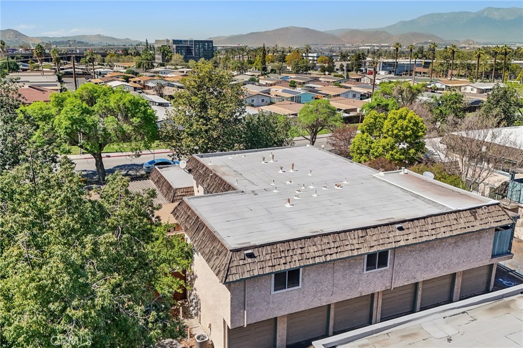 2561 Gonzaga Lane Riverside, CA 92507 - Photo 41 of 48 an aerial view of a house with a yard and lake view