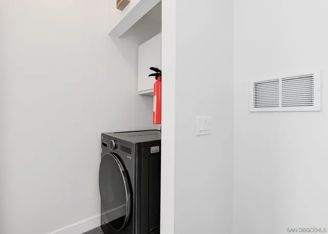 a view of storage and utility room