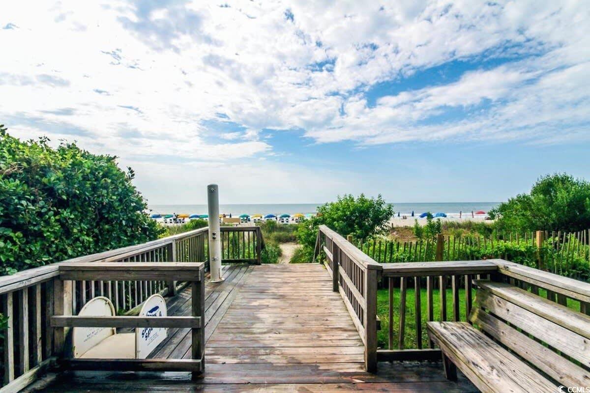 2504 North Ocean Boulevard, Unit 1234 Myrtle Beach, SC 29577 - Photo 19 of 22 Wooden deck with view of water and beach