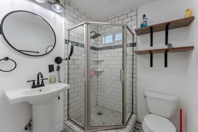 a close view of a utility room with washer and dryer