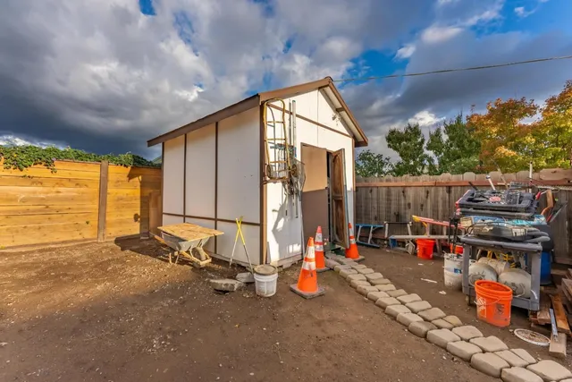 an aerial view of houses with yard