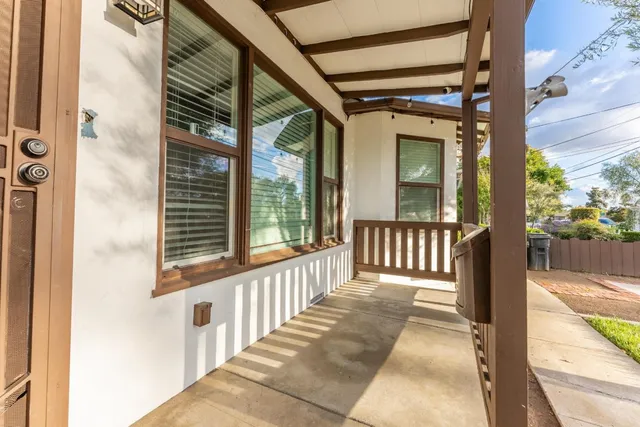 a view of a porch with a glass door