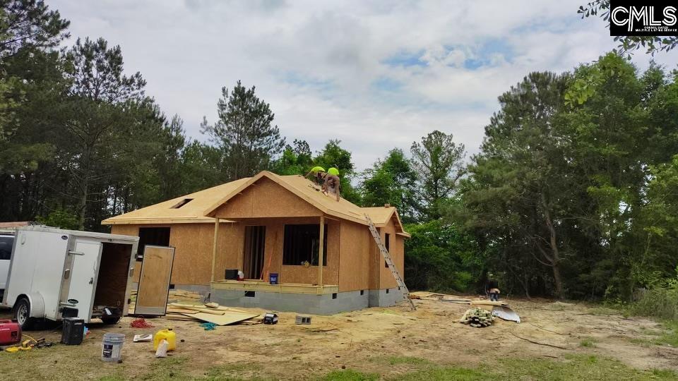 116 Sunny Acres Road Eastover, SC 29044 - Photo 40 of 40 a front view of a house with a yard