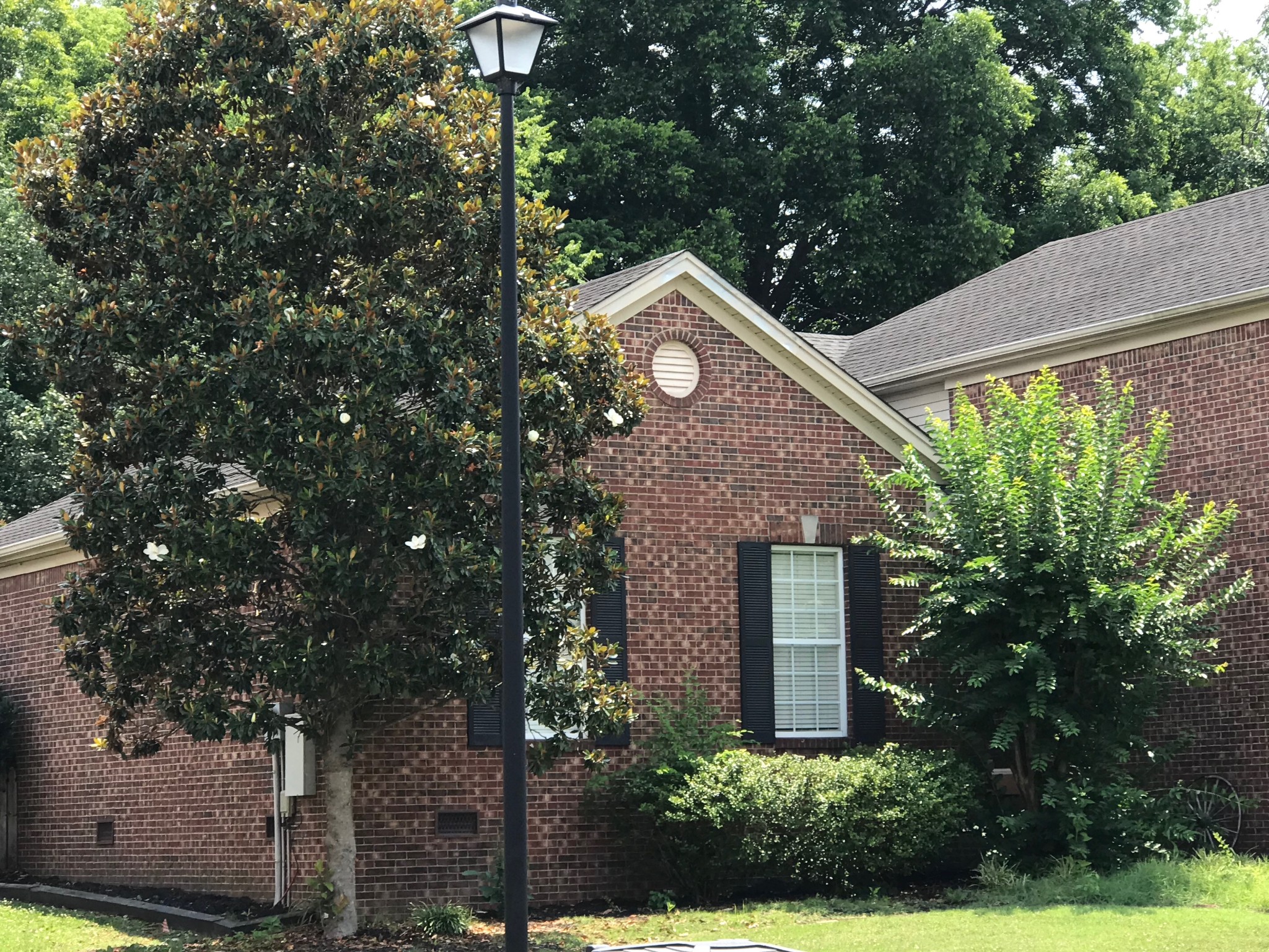 330 Astor Way Franklin, TN 37064 - Photo 3 of 17 a front view of a house with garden