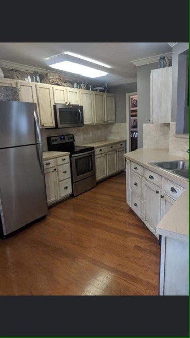 330 Astor Way Franklin, TN 37064 - Photo 8 of 17 a kitchen with stainless steel appliances a sink and a stove