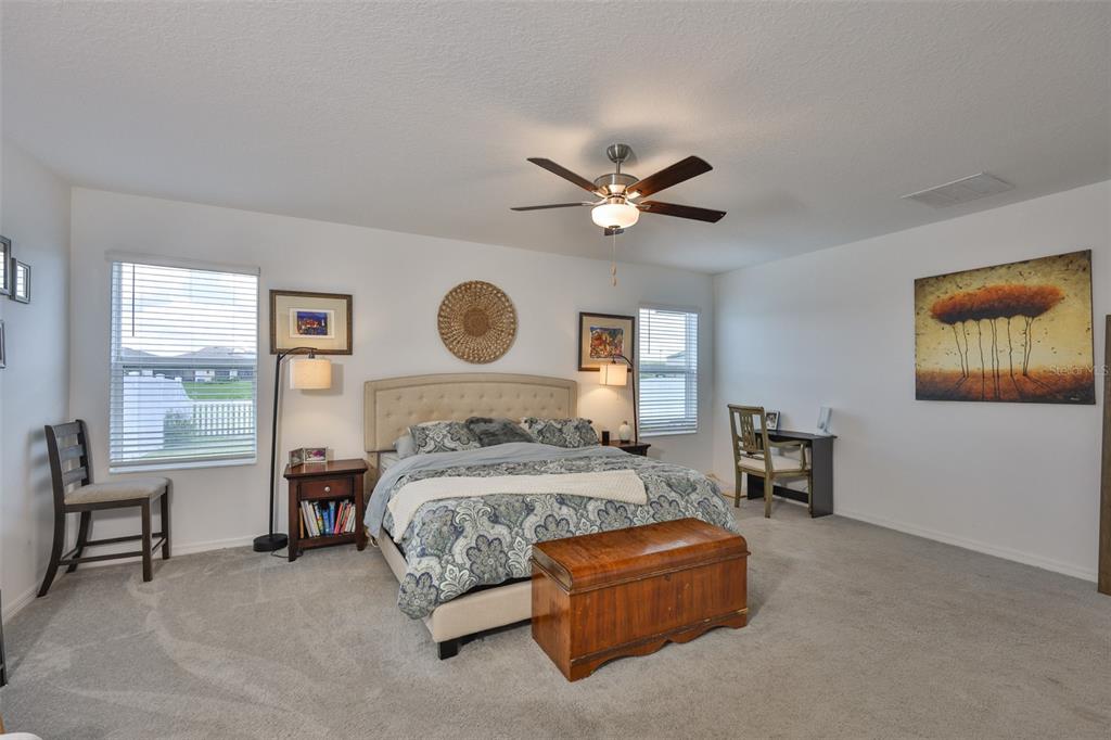 12746 Weston Oaks Lane Riverview, FL 33579 - Photo 23 of 56 a bedroom with a bed couch and a window