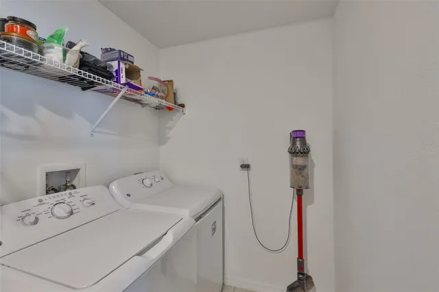 a view of a swimming pool in front of the house