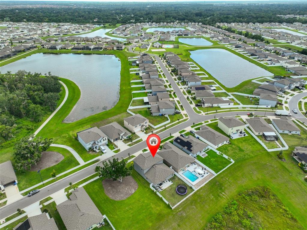 12746 Weston Oaks Lane Riverview, FL 33579 - Photo 52 of 56 an aerial view of tennis court