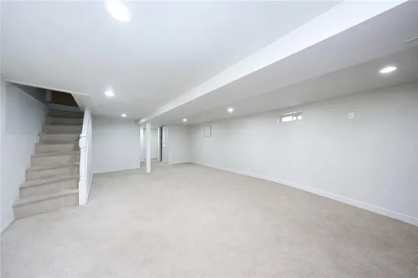 an empty room with a hallway