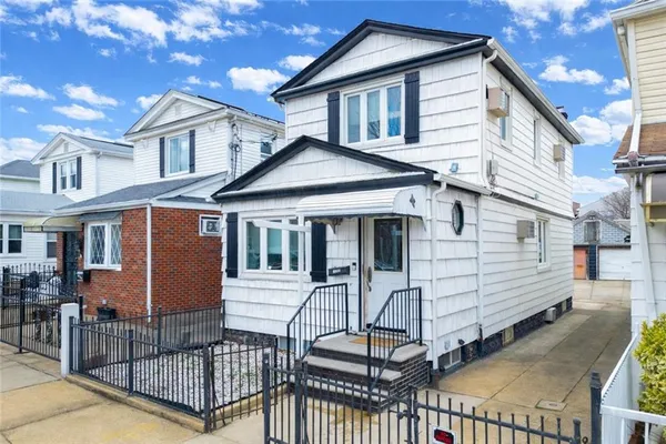 a front view of a house with balcony