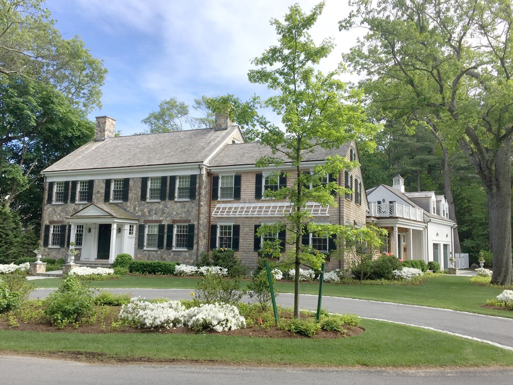 44 Valley Road Wellesley, MA 02481 - Photo 1 of 30 a front view of a house with a garden
