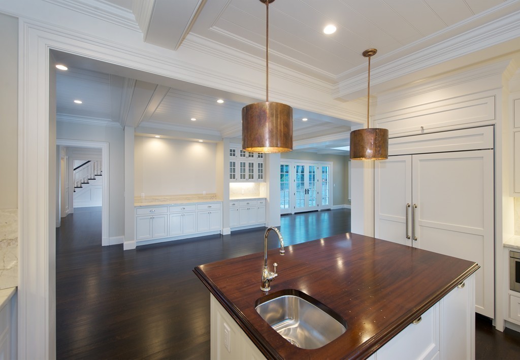44 Valley Road Wellesley, MA 02481 - Photo 11 of 30 a view of a room with shelves and wooden floor
