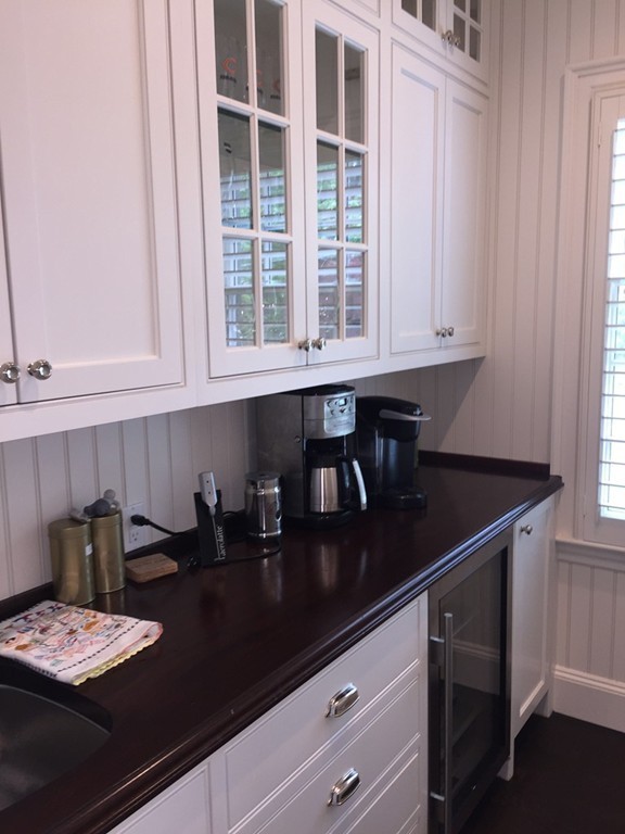 44 Valley Road Wellesley, MA 02481 - Photo 13 of 30 a kitchen with a sink and cabinets