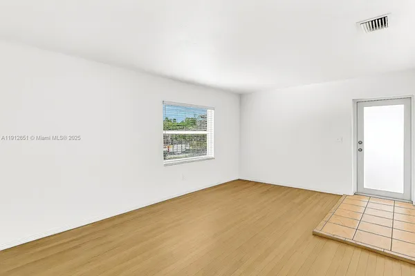 an empty room with a window