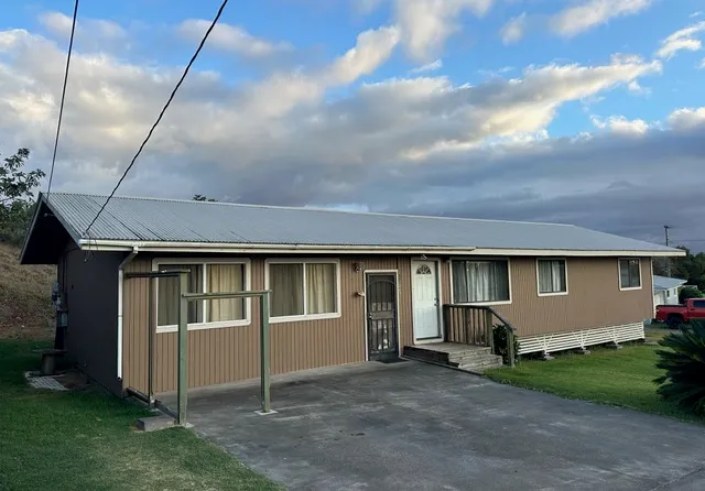 a front view of house with yard