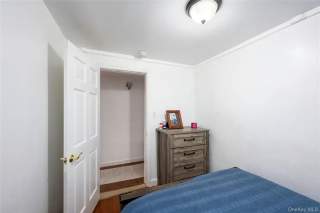 a view of room with wooden floor