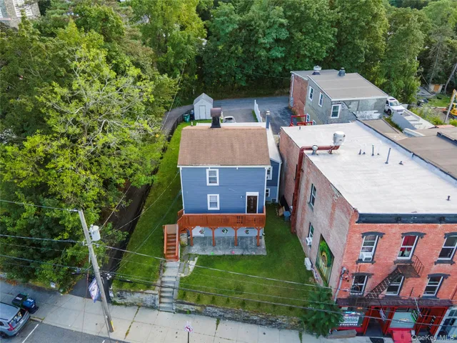 an aerial view of a house with a garden