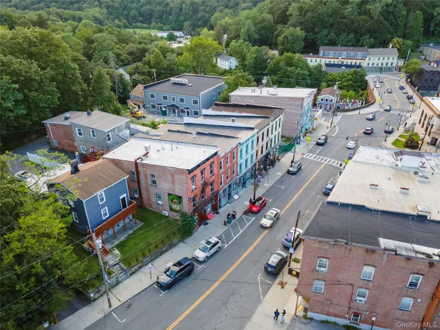 an aerial view of a house with a garden