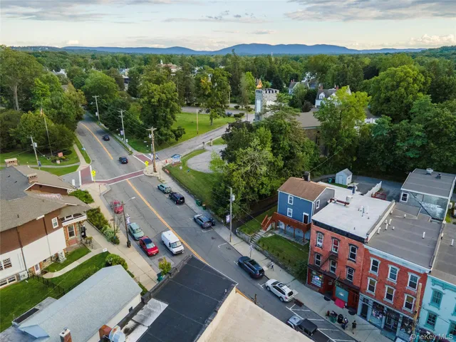 an aerial view of a city with lots of residential buildings