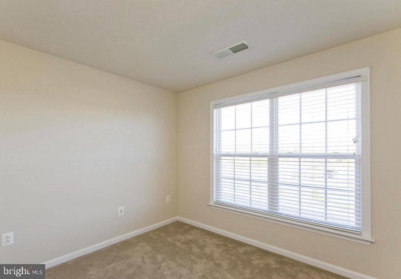 73 Spoon Square Front Royal, VA 22630 - Photo 10 of 28 an empty room with a window