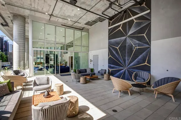 a view of outdoor sitting area with furniture