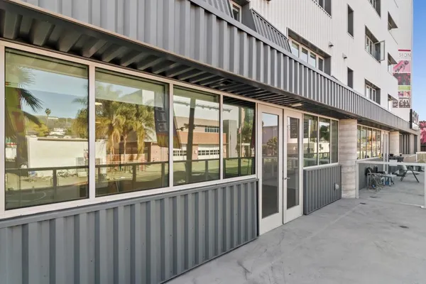 a view of a porch with wooden floor