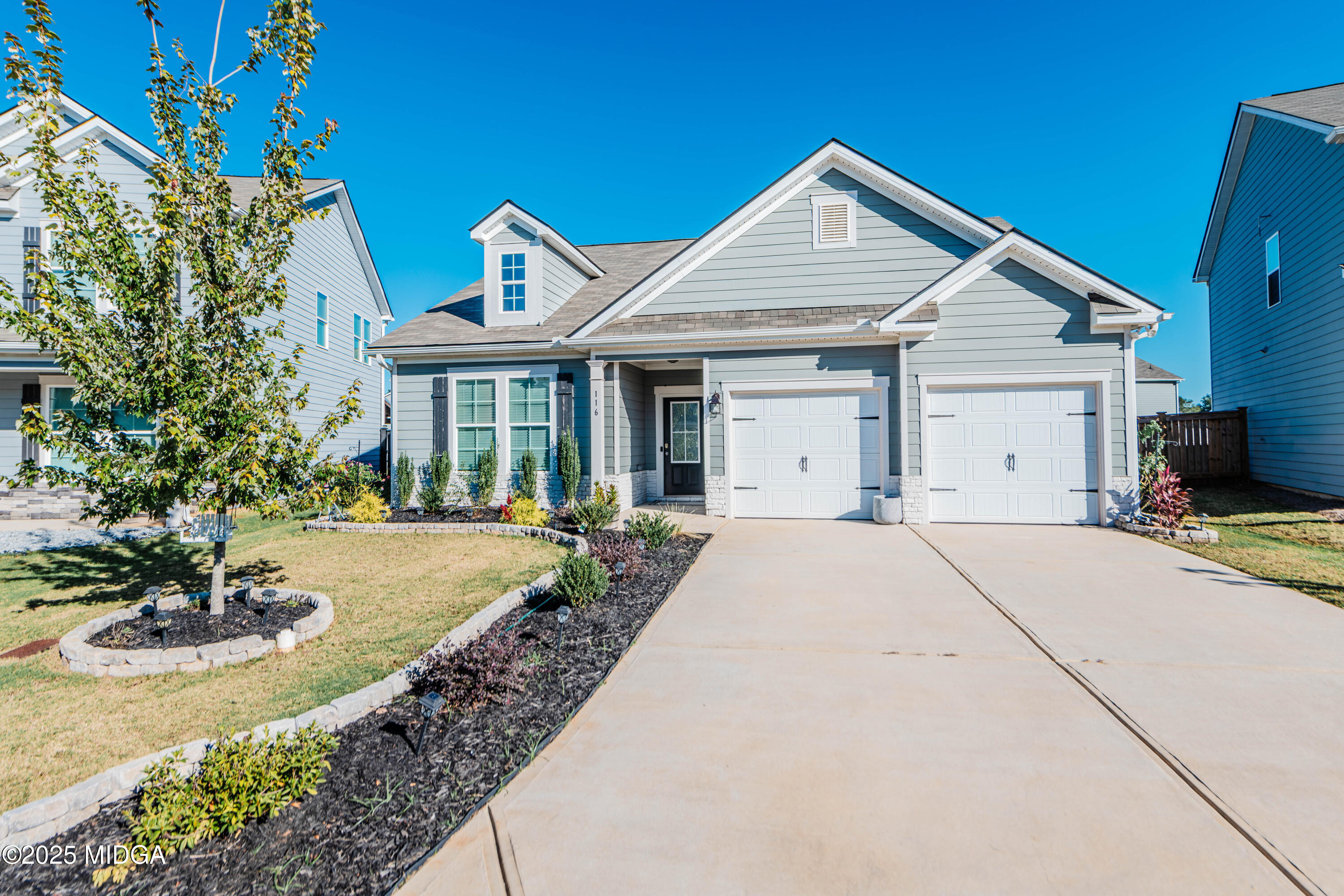 116 Red Birch Lane Warner Robins, GA 31093 - Photo 1 of 34 a view of a house with pool and garden