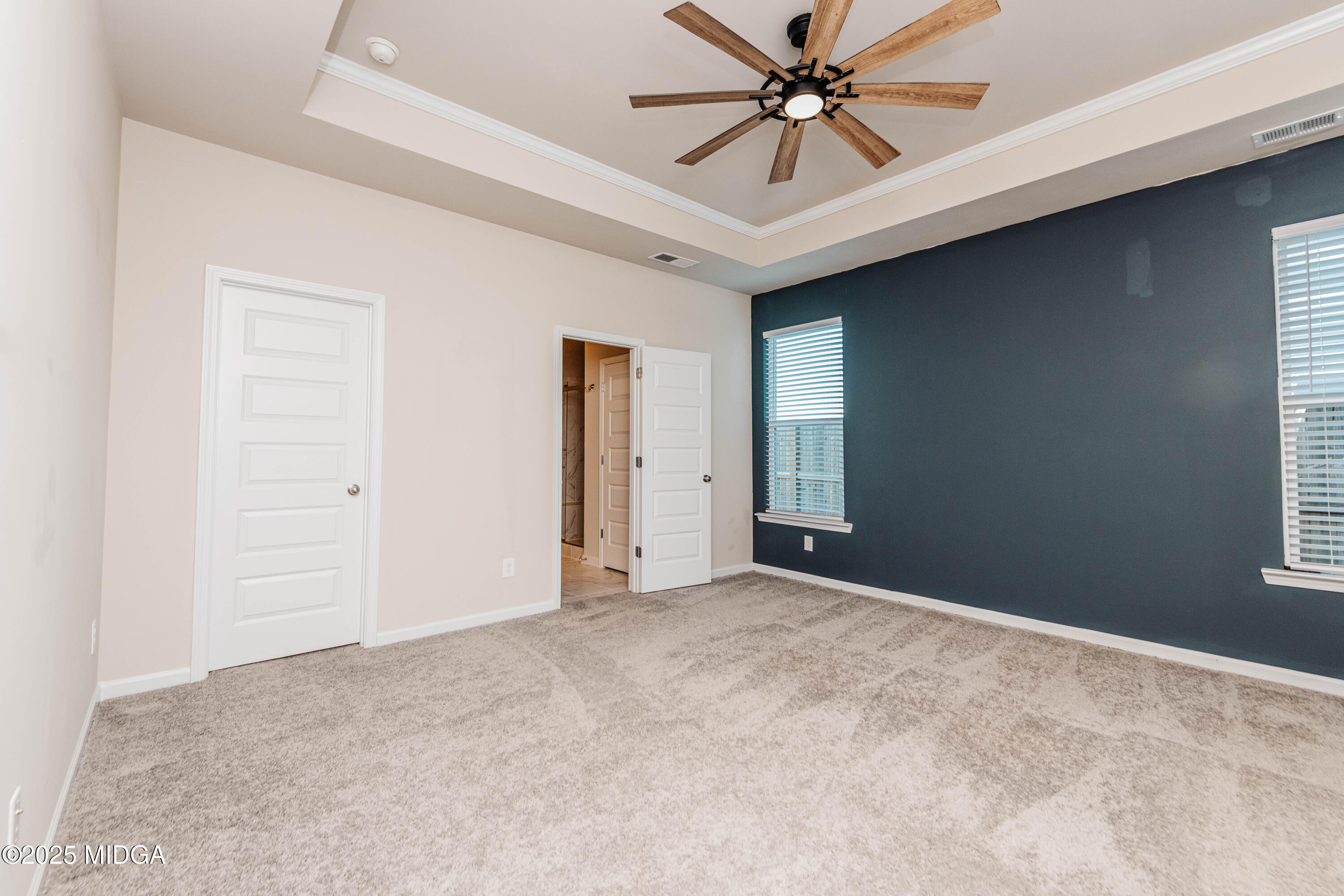 116 Red Birch Lane Warner Robins, GA 31093 - Photo 28 of 34 a view of a livingroom with a ceiling fan and window