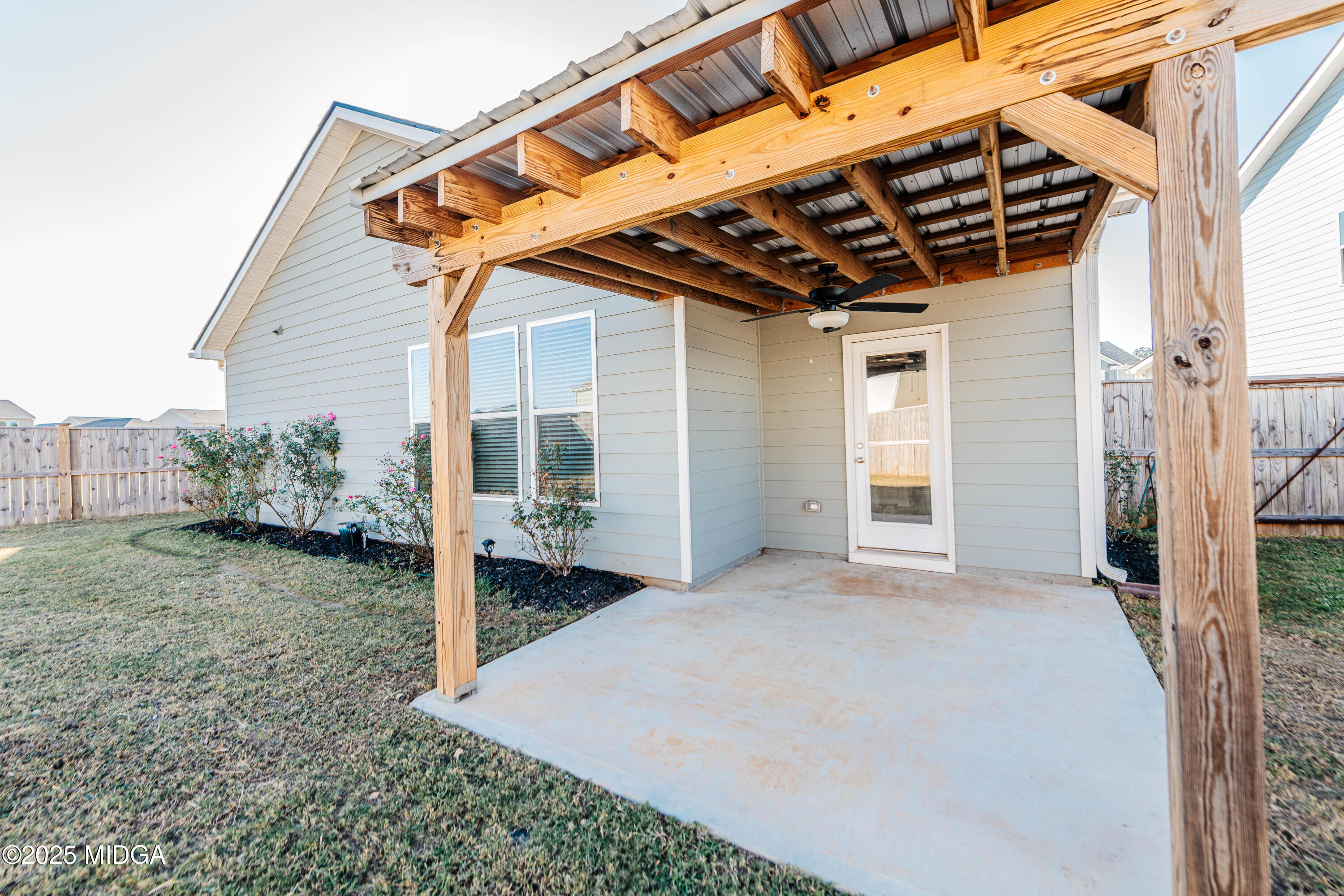 116 Red Birch Lane Warner Robins, GA 31093 - Photo 33 of 34 a view of a wooden house with a yard