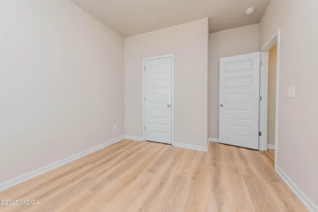 an empty room with closet