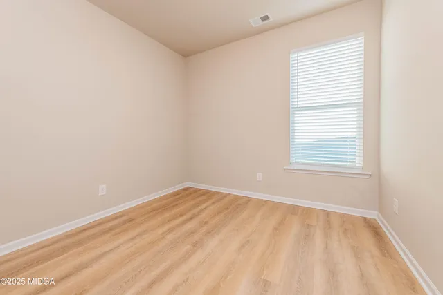 an empty room with a window