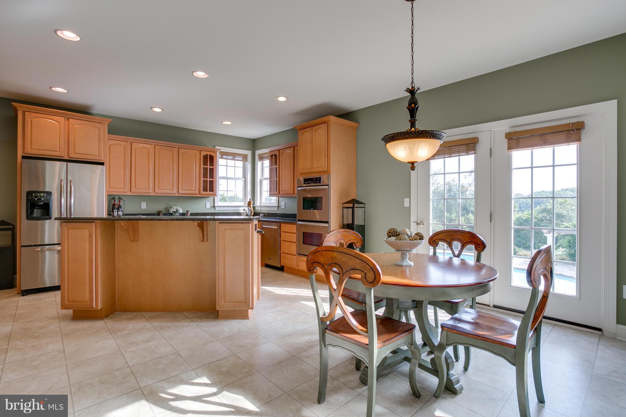 4628 Dave Rill Road Hampstead, MD 21074 - Photo 12 of 30 a view of a dining room with furniture window and outside view