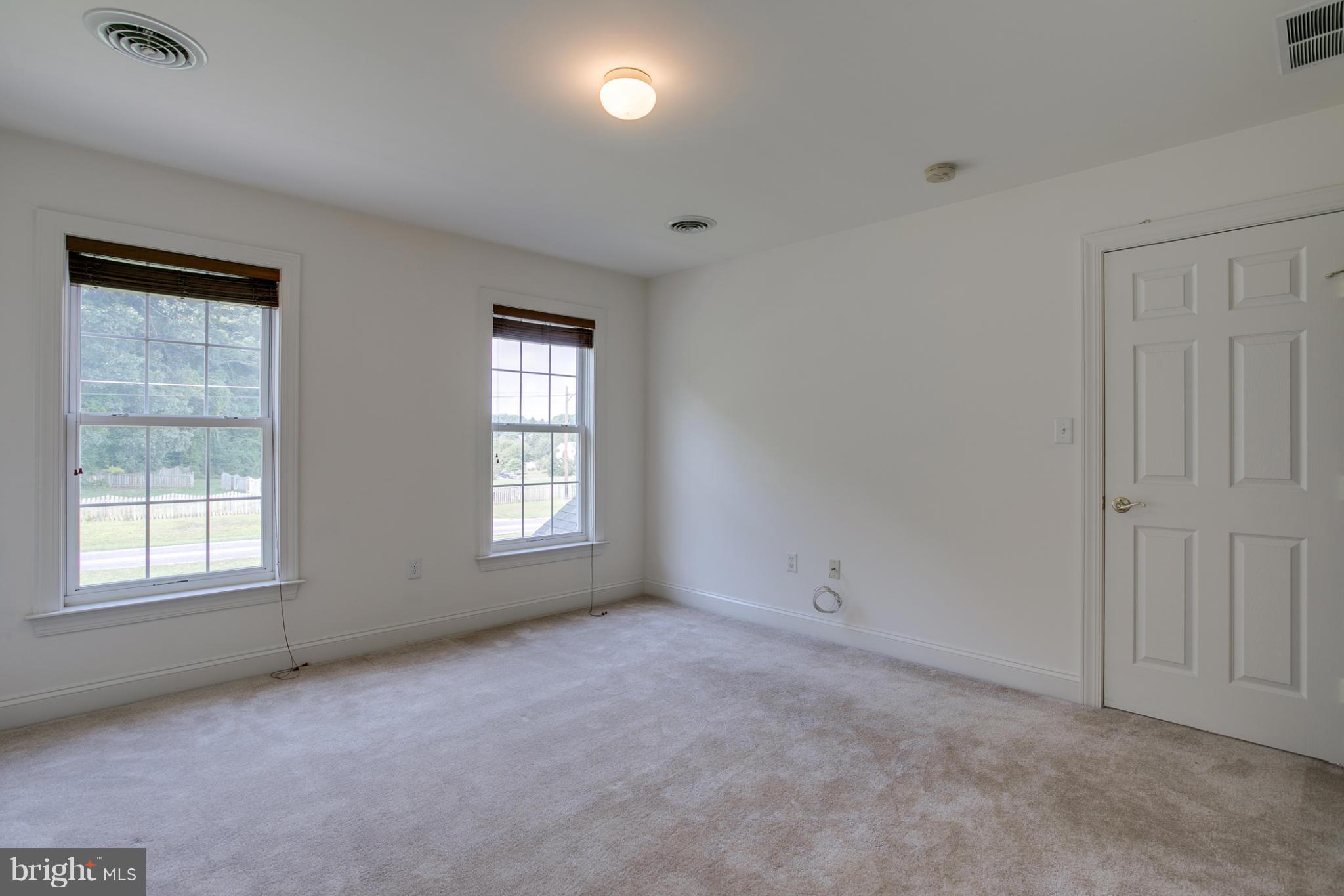 4628 Dave Rill Road Hampstead, MD 21074 - Photo 16 of 30 an empty room with windows